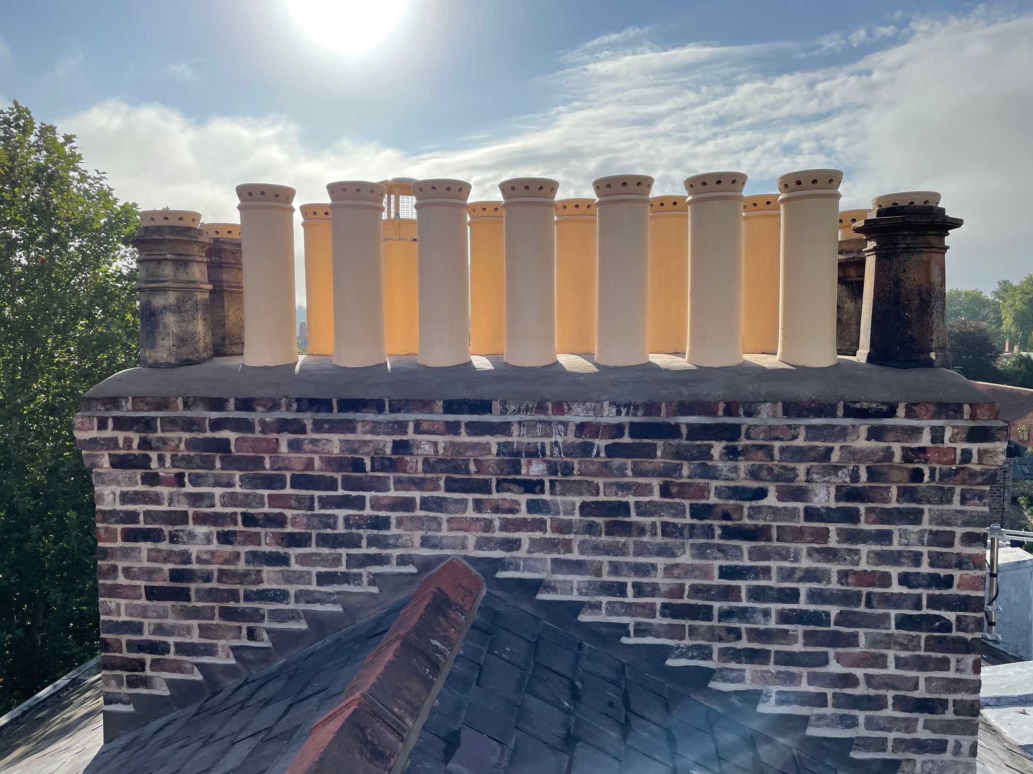Rain cap chimney cowl on a chimney pot