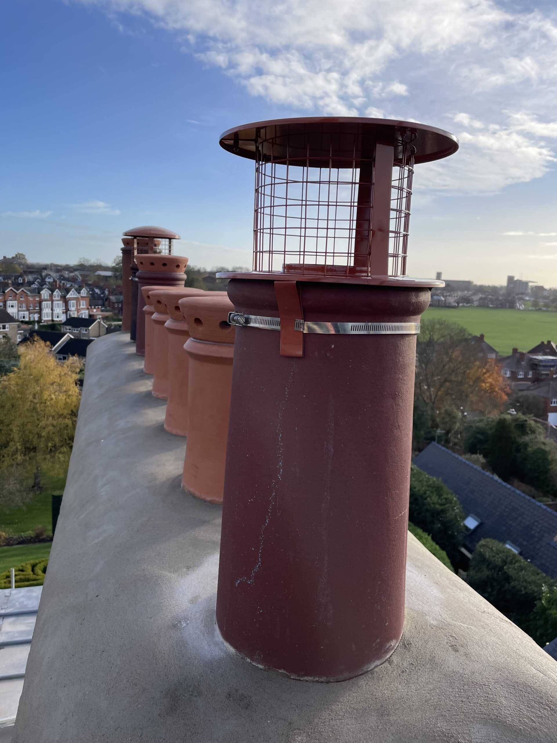 Chimney cowl installed on a traditional UK chimney stack